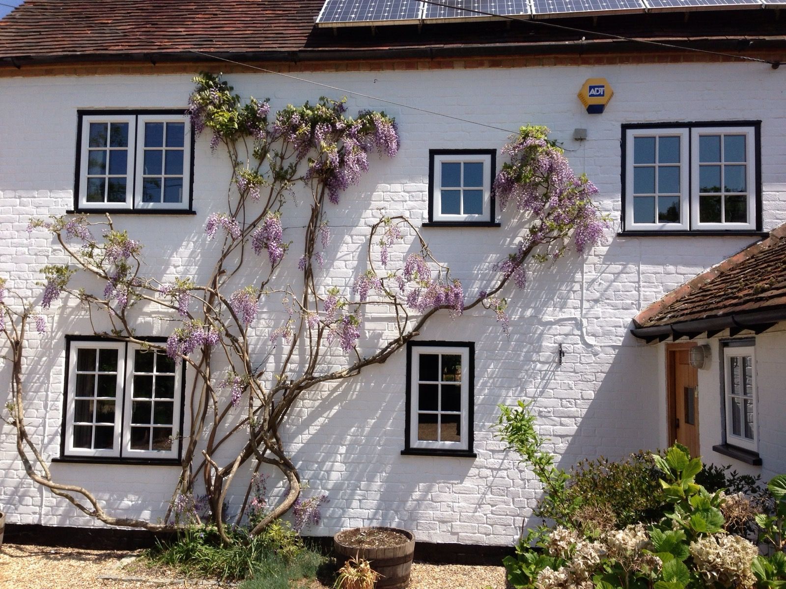 Black timber casement windows cottage