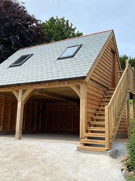 Oak framed garage with a room above and an external oak staircase