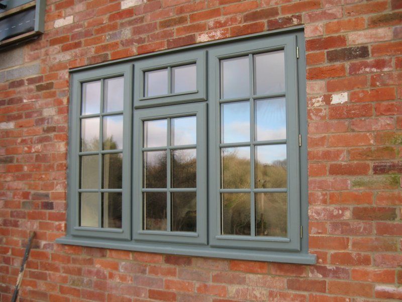 Grey timber window brick