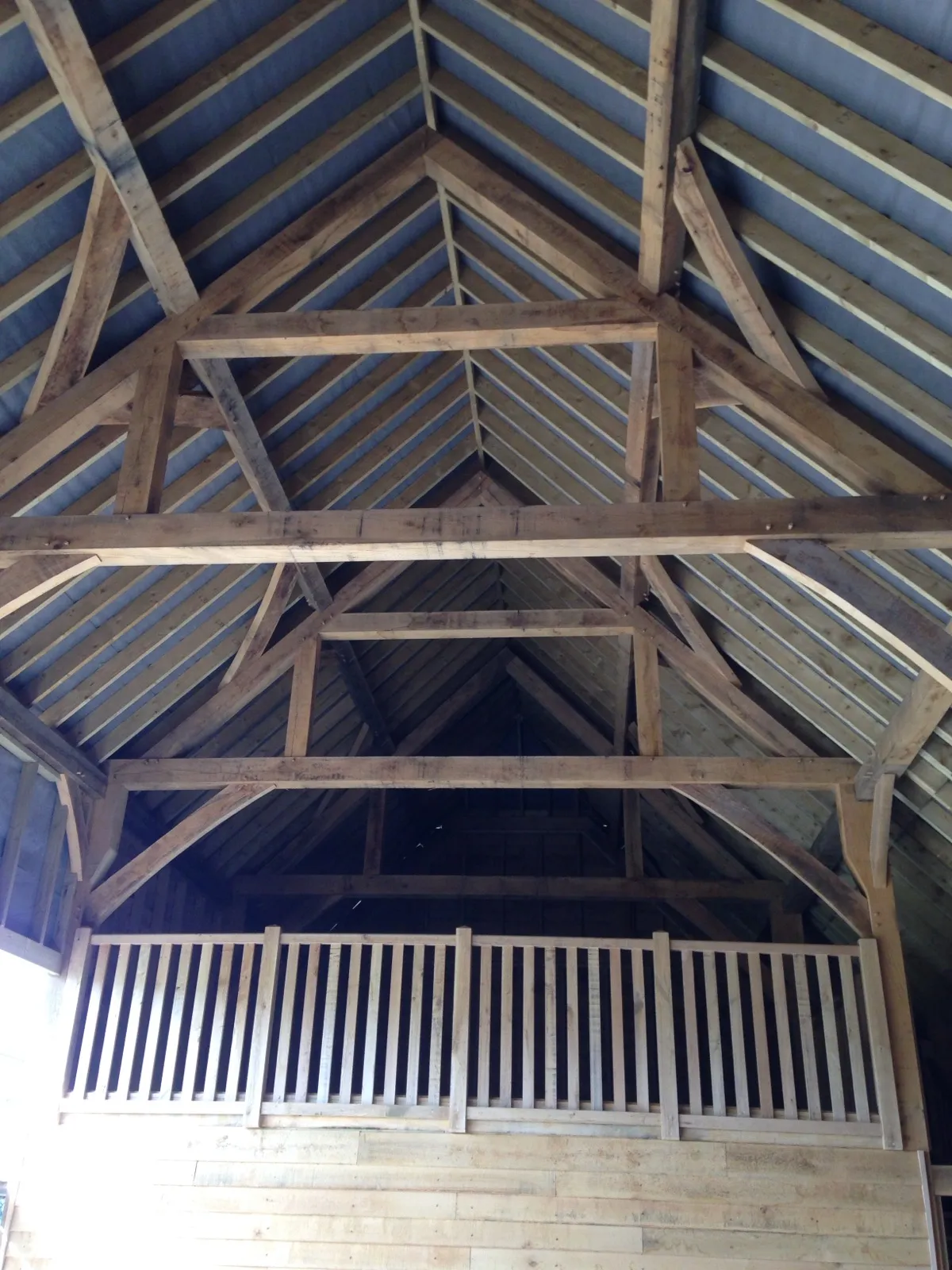 Oak barn interior vaulted trusses