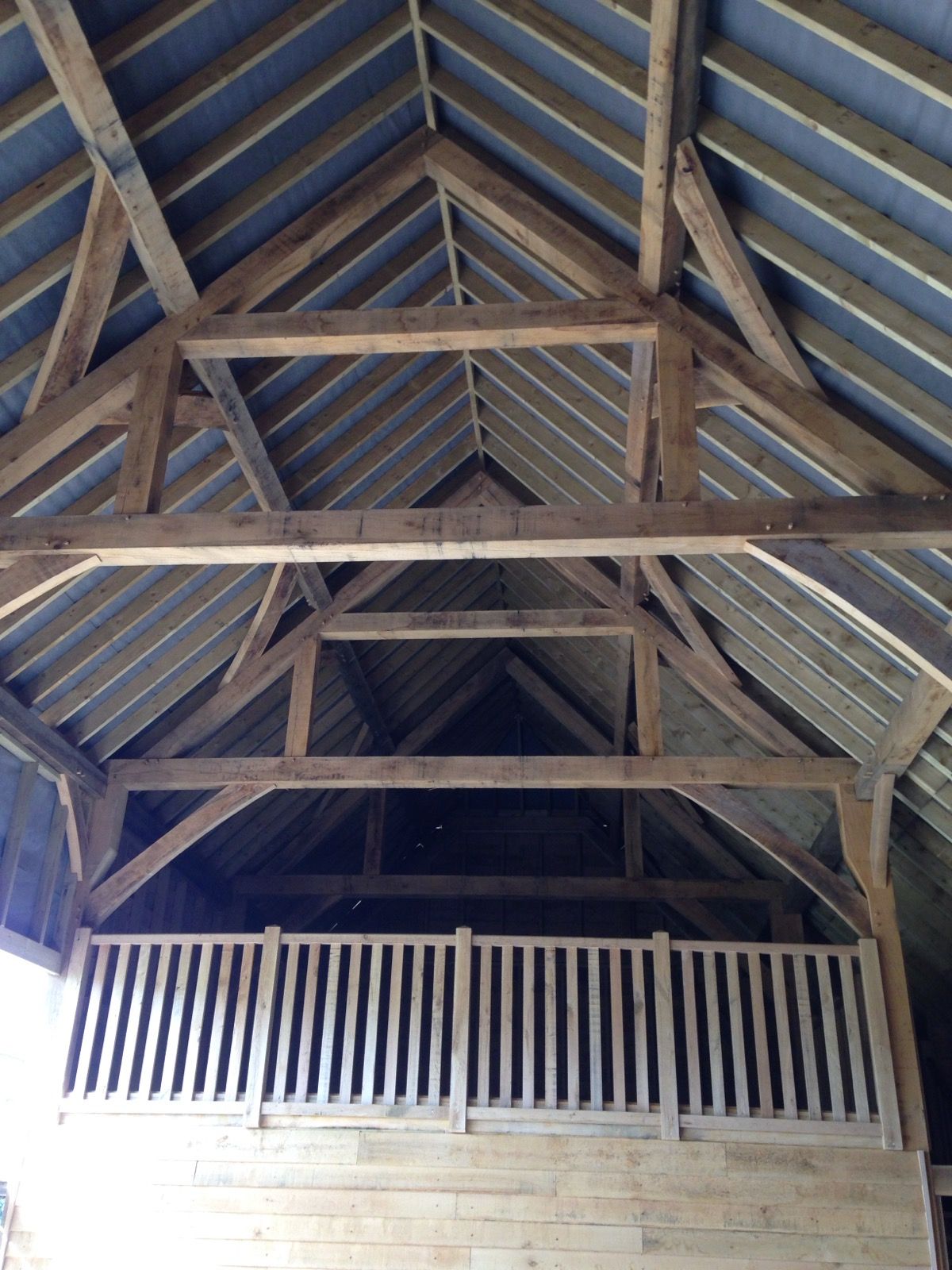 Oak barn interior vaulted trusses