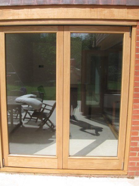 Oak bifold doors curved