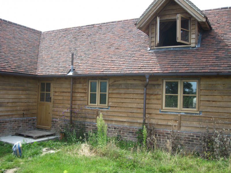 Oak clad building windows