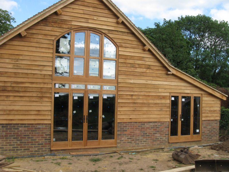 Oak framed arched window