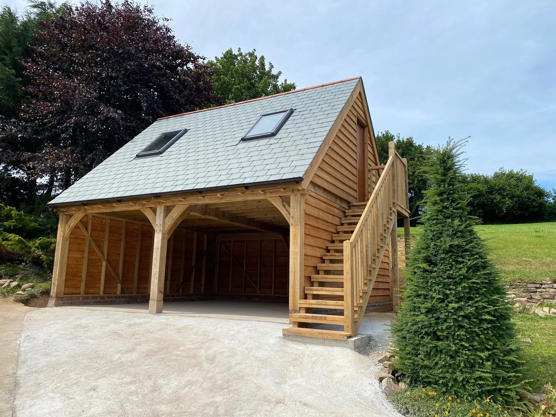 Oak framed garage log store
