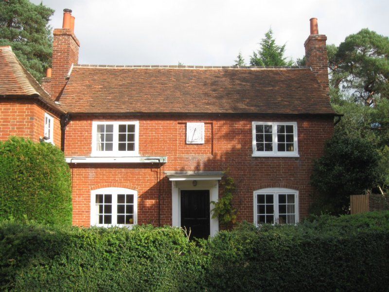Timber windows brick house