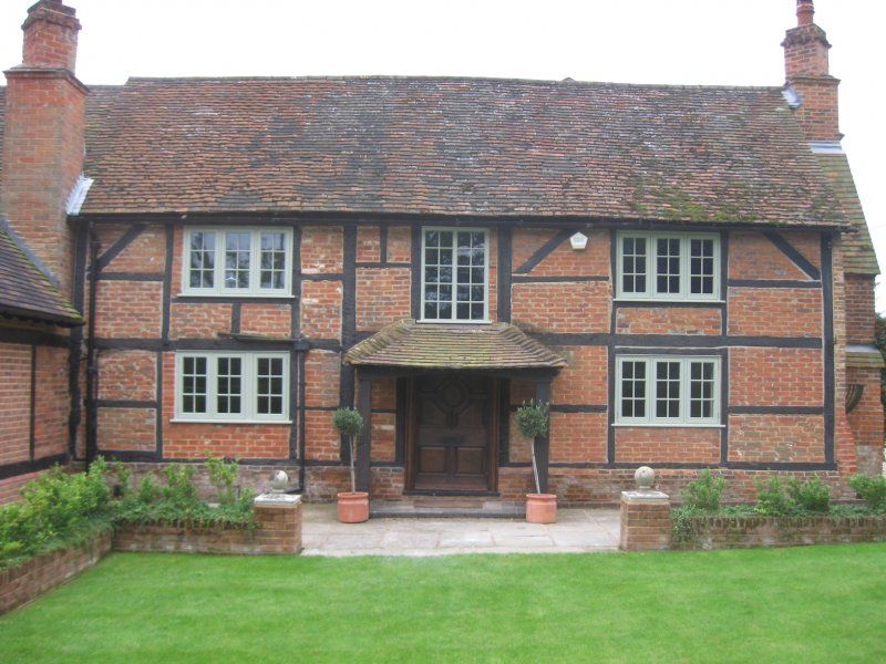 Timber windows brick house