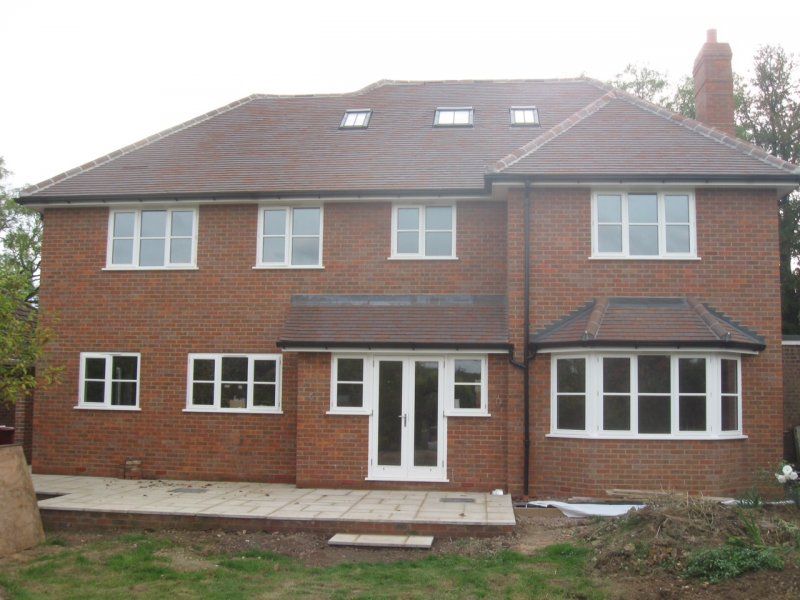 Timber windows brick house
