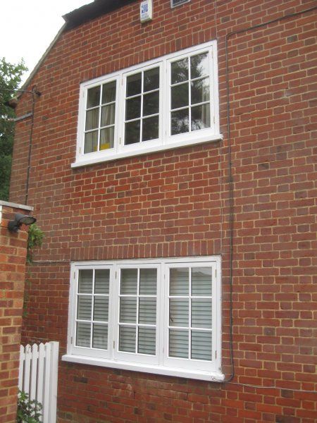 Timber windows brick house