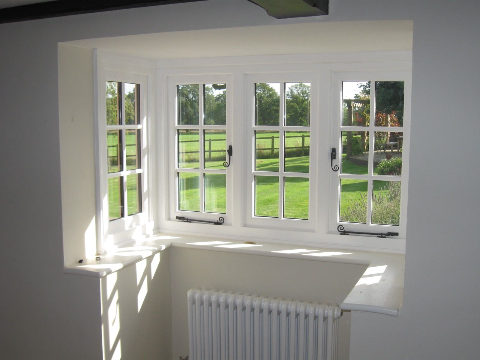 White timber casement bay window interior