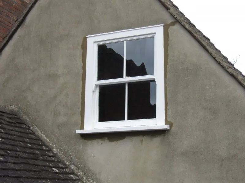 White timber casement window
